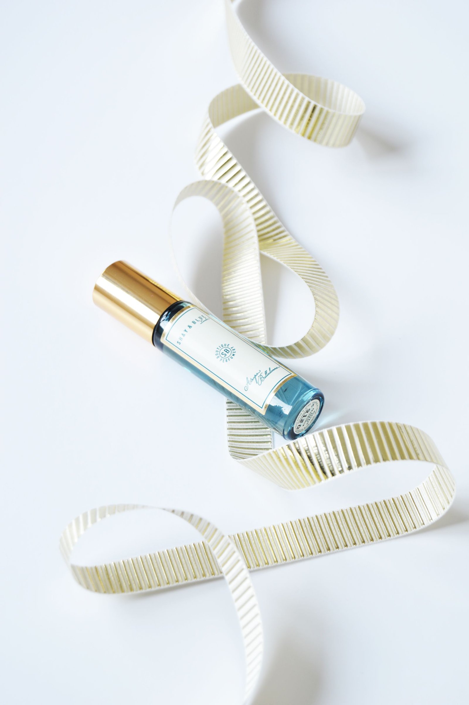 Shay and Blue Atropa Belladonna Fragrance is a natural fragrance. Decadent scent of dark cassis berries blended with flower blooms of narcissus and jasmine, on a base of rich bourbon vanilla. It is a long lasting scent and it leaves such a soft and beautiful scent.